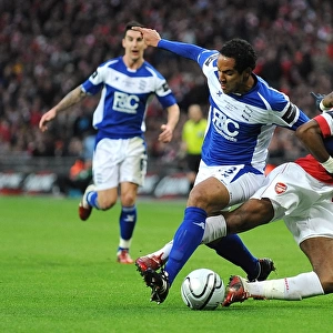Battleground Wembley: Beausejour vs. Song - Carling Cup Final Showdown: Birmingham City's Jean Beausejour and Arsenal's Alex Song Clash in Intense Rivalry