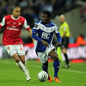 Battling for the Carling Cup: Obafemi Martins vs. Gael Clichy - A Football Rivalry at Wembley Stadium