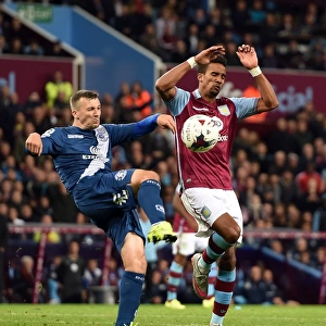 Battling for Control: Caddis vs. Sinclair in the Intense Capital One Cup Rivalry at Villa Park