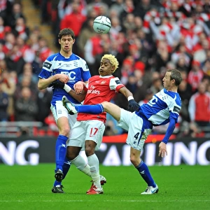 Clash at Wembley: Alex Song vs. Nikola Zigic and Lee Bowyer - A Battle in the Carling Cup Final Between Arsenal and Birmingham City