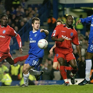 Drogba vs Tebily and Melchiot: A FA Cup Battle at Stamford Bridge (January 30, 2005) - Chelsea's Didier Drogba Clashes with Birmingham City's Olivier Tebily and Mario Melchiot