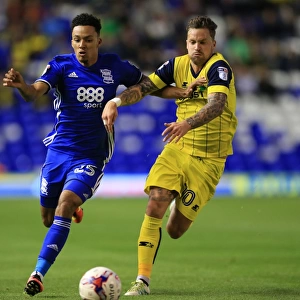 Intense Rivalry: Dacres-Cogley vs Maguire Battle for Possession - Birmingham City vs Oxford United (EFL Cup)
