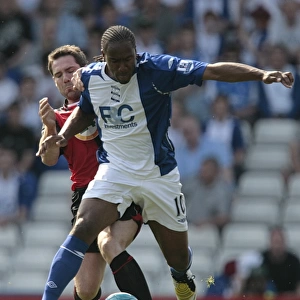 Intense Rivalry: David Dunn vs. Cameron Jerome Battle for Ball in Birmingham City vs. Blackburn Rovers (Premier League, St. Andrew's, 11-05-2008)