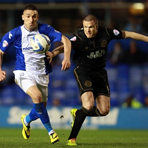 Macheda's Powerful Performance: Outmuscling Caldwell in Birmingham City's Championship Battle