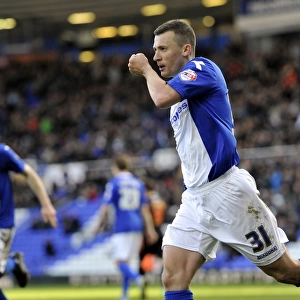 Paul Caddis Scores the Penalty: Birmingham City's Early Lead in Sky Bet Championship Match against Reading (March 2014)