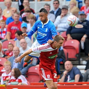 Red-Hot Rivalry: Nathan Redmond vs. Tony McMahon in the Npower Championship Clash between Middlesbrough and Birmingham City (21-08-2011, Riverside Stadium)