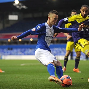 Tense FA Cup Moment: Rusnak Crosses Amidst Williams Pressure between Birmingham City and Swansea City