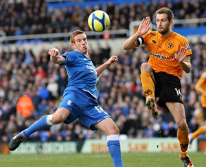 Airtight FA Cup Showdown: Rooney vs. Johnson's Heading Battle - Birmingham City vs. Wolverhampton Wanderers (January 7, 2012)