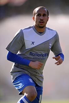 Images Dated 3rd March 2012: Andros Townsend Faces Off Against Derby County at Birmingham City's St