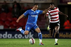 Images Dated 30th March 2012: Andros Townsend vs. Habib Beye: Birmingham City vs. Doncaster Rovers