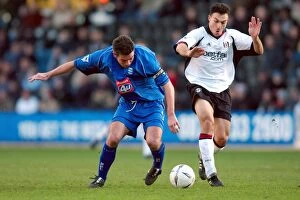 Images Dated 7th January 2003: Battle for the Ball: Steed Malbranque vs. Jeff Kenna (FA Cup Third Round, Fulham vs)