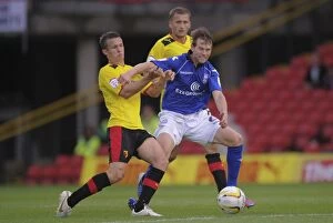 Images Dated 25th August 2012: Battling for Control: Hogg vs. Spector in the Npower Championship Showdown