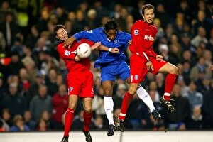 30-01-2005, Round 4 v Chelsea, Stamford Bridge Collection: Battling for the FA Cup: Drogba's Tussle with Upson and Clemence (2005) - Chelsea vs