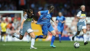 Battling for the FA Cup: A Riveting Moment between Karen Carney and Claire Rafferty of Birmingham City Ladies and Chelsea Ladies