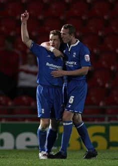 30-03-2012 v Doncaster Rovers, Keepmoat Stadium Collection: Birmingham City: Chris Burke and Peter Ramage Celebrate Goal in Npower Championship Match vs