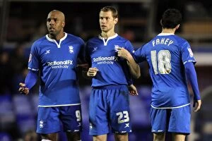 Images Dated 22nd November 2011: Birmingham City FC: Marlon King, Jonathan Spector, and Keith Fahey Unite to Fortify Defense