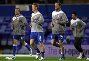 Images Dated 26th October 2011: Birmingham City FC: Rooney, Burke, Caldwell, and Ridgewell in Action against Leeds United