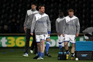 Images Dated 7th December 2011: Birmingham City FC: Steven Caldwell and Chris Burke in Deep Focus before Npower Championship Clash