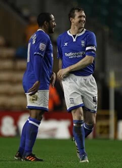18-01-2012, FA Cup Round 3 Replay v Wolverhampton Wanderers, Molineux Stadium Collection: Birmingham City FC: Steven Caldwell and Jean Beausejour Celebrate Wade Elliott's FA Cup-Winning
