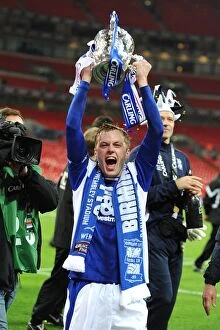 Birmingham City FC's Sebastian Larsson Triumphantly Holds the Carling Cup at Wembley Stadium