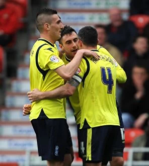 Images Dated 5th April 2014: Birmingham City: Novak Scores and Celebrates with Macheda and Robinson in Sky Bet Championship Win