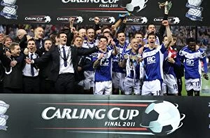 The Birmingham City squad celebrate with the trophy after the final whistle