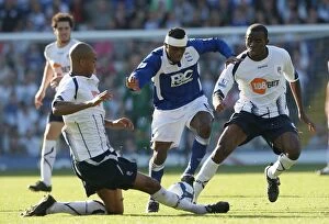 Images Dated 26th September 2009: Birmingham City vs. Bolton Wanderers: Cristian Benitez Fouled by Zat Knight (Premier League, 2009)