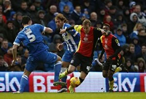 Images Dated 28th November 2015: Birmingham City vs Brighton & Hove Albion: Nicolai Brock-Madsen's Intense Battle for the Ball in