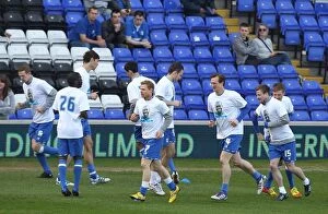 Images Dated 25th March 2012: Birmingham City vs. Cardiff City: St. Andrew's - Footballers Engaged in Pre-Match Warm-Up
