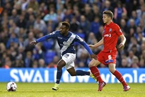 Capital One Cup - Second Round - Birmingham City v Gillingham - St. Andrew's Collection: Birmingham City vs Gillingham: Maghoma Outruns Houghton in Thrilling Capital One Cup Clash