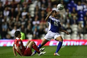 Images Dated 21st September 2010: Birmingham City vs Milton Keynes Dons: A Fight for Carling Cup Possession (September 2010)