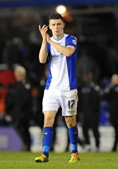 Images Dated 7th December 2013: Birmingham City's Callum Reilly Salutes Fans After Hard-Fought Championship Match vs