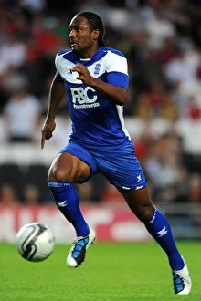 Images Dated 3rd August 2010: Birmingham City's Cameron Jerome in Action against Milton Keynes Dons (August 3, 2010)