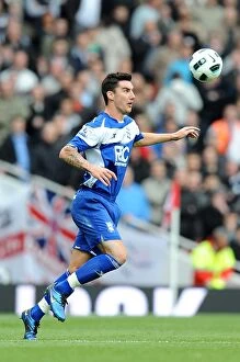 Images Dated 16th October 2010: Birmingham City's Liam Ridgewell Faces Off Against Arsenal in the Barclays Premier League at