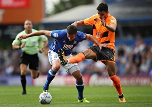 Birmingham City's Lukas Jutkiewicz Evasively Dodges Tackle from Thiago Ilori (Sky Bet Championship: Birmingham City vs Reading)