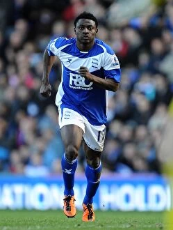 Images Dated 12th February 2011: Birmingham City's Obafemi Martins in Action Against Stoke City (Premier League, 12-02-2011)