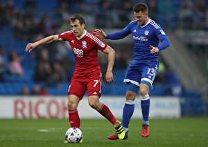 Birmingham City's Robert Tesche Fends Off Anthony Pilkington in Sky Bet Championship Clash at Cardiff City Stadium