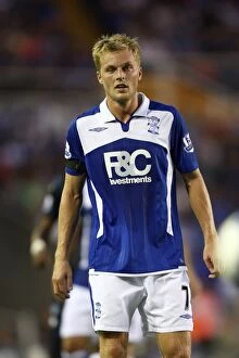 Images Dated 19th August 2009: Birmingham City's Sebastian Larsson in Action: Clash with Portsmouth