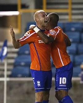 Images Dated 30th September 2014: Birmingham City's Triumph: Cotterill and Thomas Celebrate Third Goal in Sky Bet Championship Match