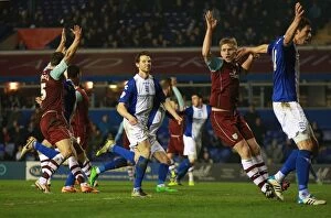 Images Dated 12th March 2014: Birmingham City's Triumphant Third Goal Amid Burnley Protests (Sky Bet Championship: March 12, 2014)
