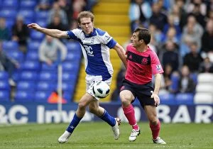 Images Dated 2nd October 2010: Birmingham vs. Everton: A Battle for the Ball - Leighton Baines vs