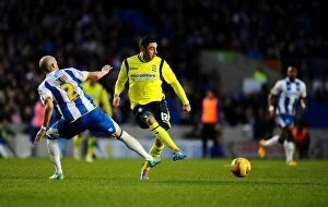 Sky Bet Championship : Brighton and Hove Albion v Birmingham City : AMEX Stadium : 11-01-2014 Collection: Callum Reilly Outsmarts Bruno Saltor: A Pivotal Moment in Birmingham City's Sky Bet Championship