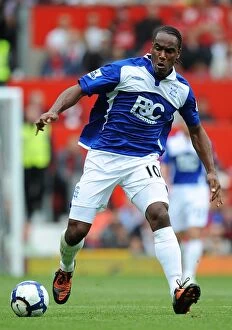 Images Dated 16th August 2009: Cameron Jerome vs Manchester United: Birmingham City's Brave Battle at Old Trafford (16-08-2009)