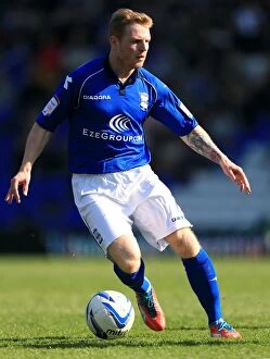 Images Dated 20th April 2013: Championship Showdown: Birmingham City vs Leeds United - Chris Burke's Action-Packed Performance