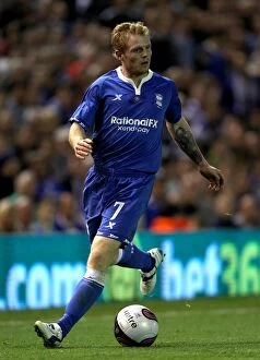 Images Dated 25th August 2011: Chris Burke in Action: Birmingham City vs. Nacional - UEFA Europa League Play-Off Second Leg (2011)