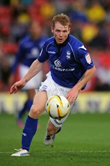 Images Dated 25th August 2012: Chris Burke in Action: Birmingham City vs. Watford at Vicarage Road (2012)