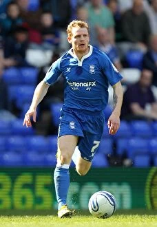 Images Dated 25th March 2012: Chris Burke in Action: Birmingham City vs Cardiff City Championship Showdown (25-03-2012)