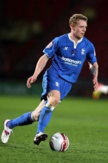 Images Dated 30th March 2012: Chris Burke in Action: Birmingham City vs Doncaster Rovers, Npower Championship