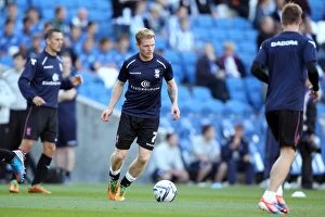 Images Dated 29th September 2012: Chris Burke of Birmingham City Focuses During Npower Championship Warm-up at AMEX Stadium vs