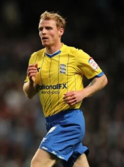Images Dated 21st September 2011: Chris Burke at Etihad Stadium: Birmingham City's Star Moment in Carling Cup Third Round Against